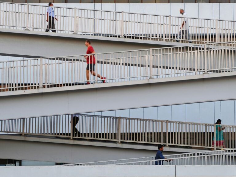 people walking outside the building